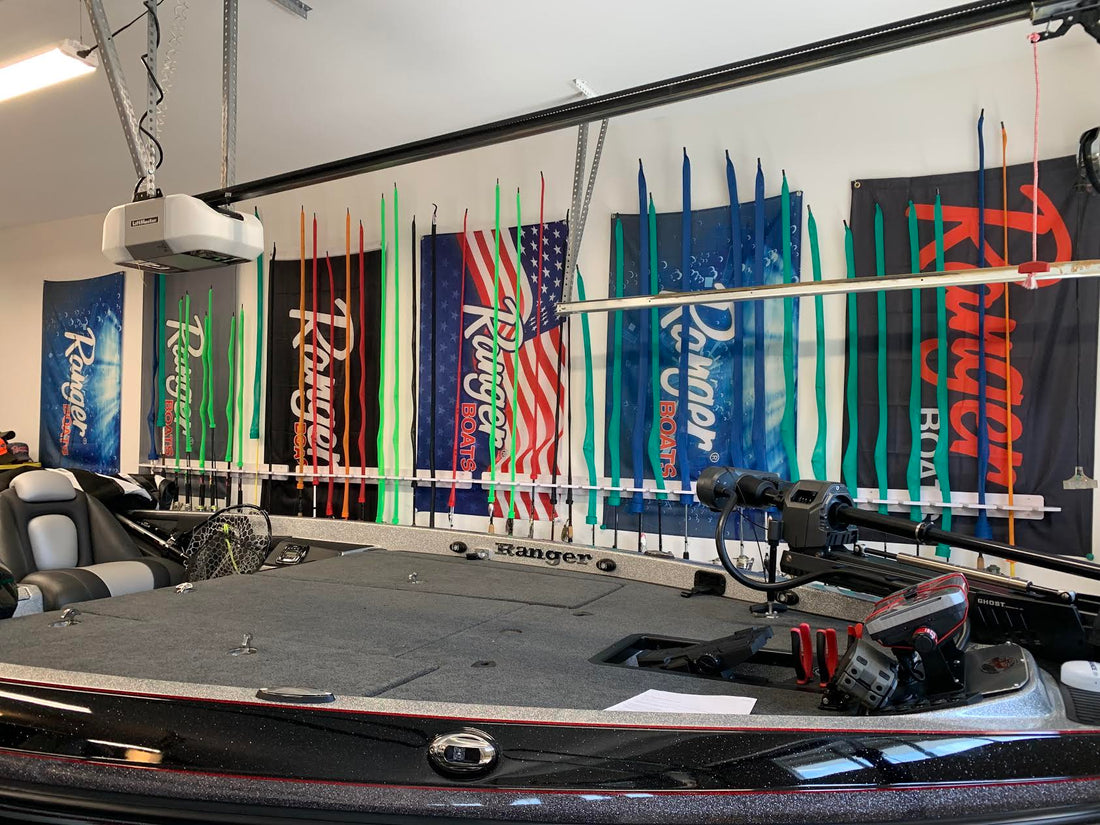 White fishing rod racks in a garage