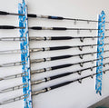 blue camo rod rack mounted on a wall