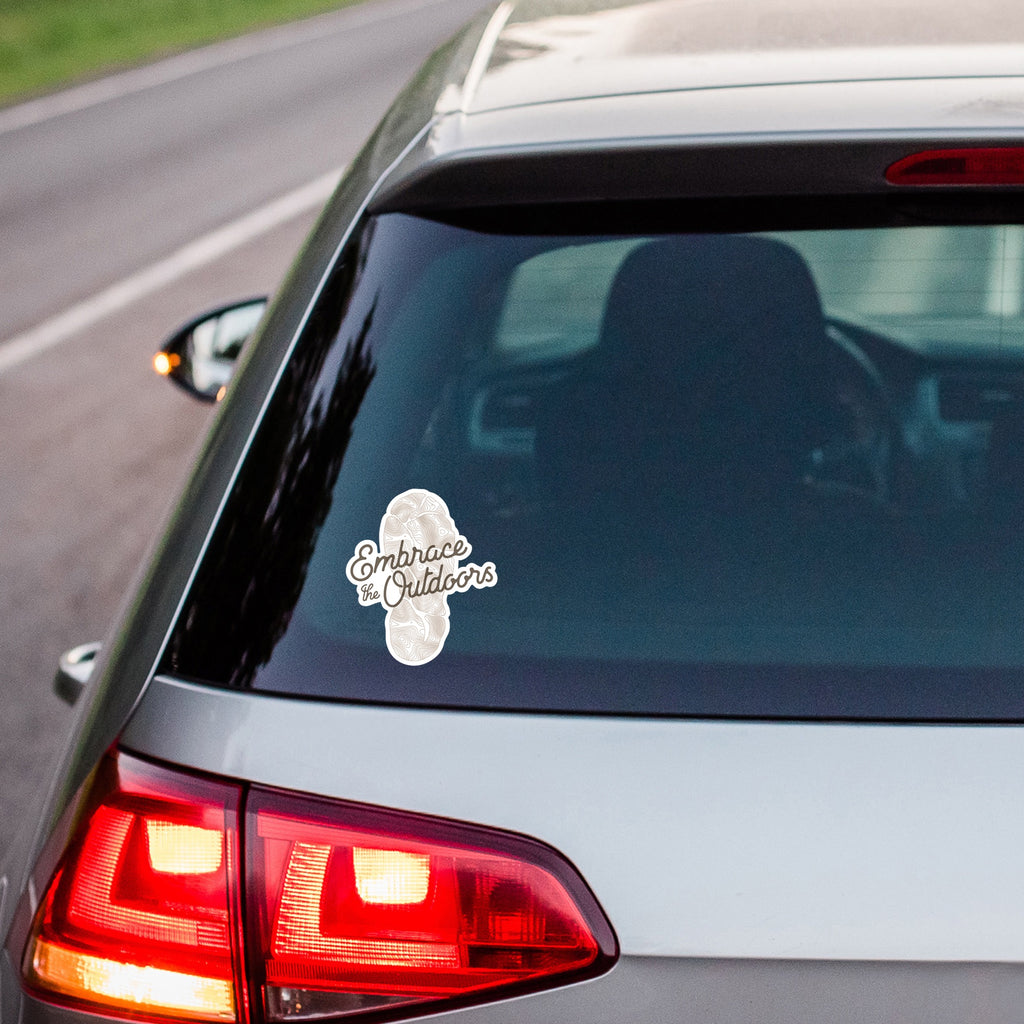 Car with 'Embrace Outdoors' sticker on the back window