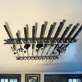 Dark elm ceiling-mounted rack with fishing rods and reels.